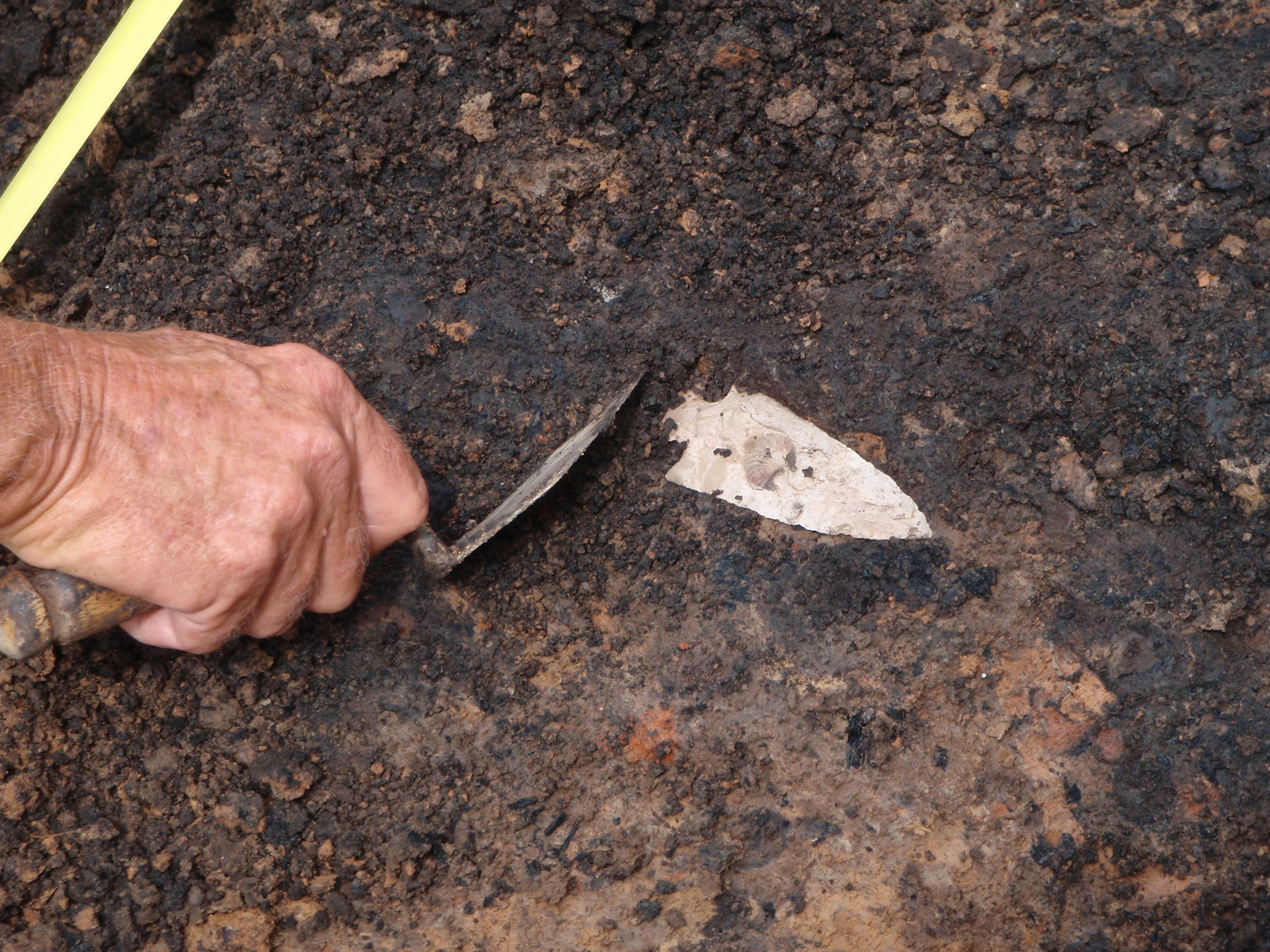 Uncovering a chert point Uncovering a chert point