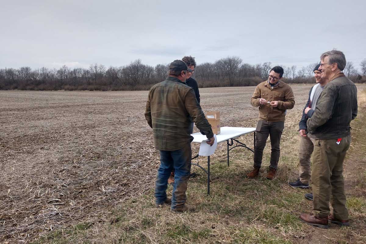 5 men in field